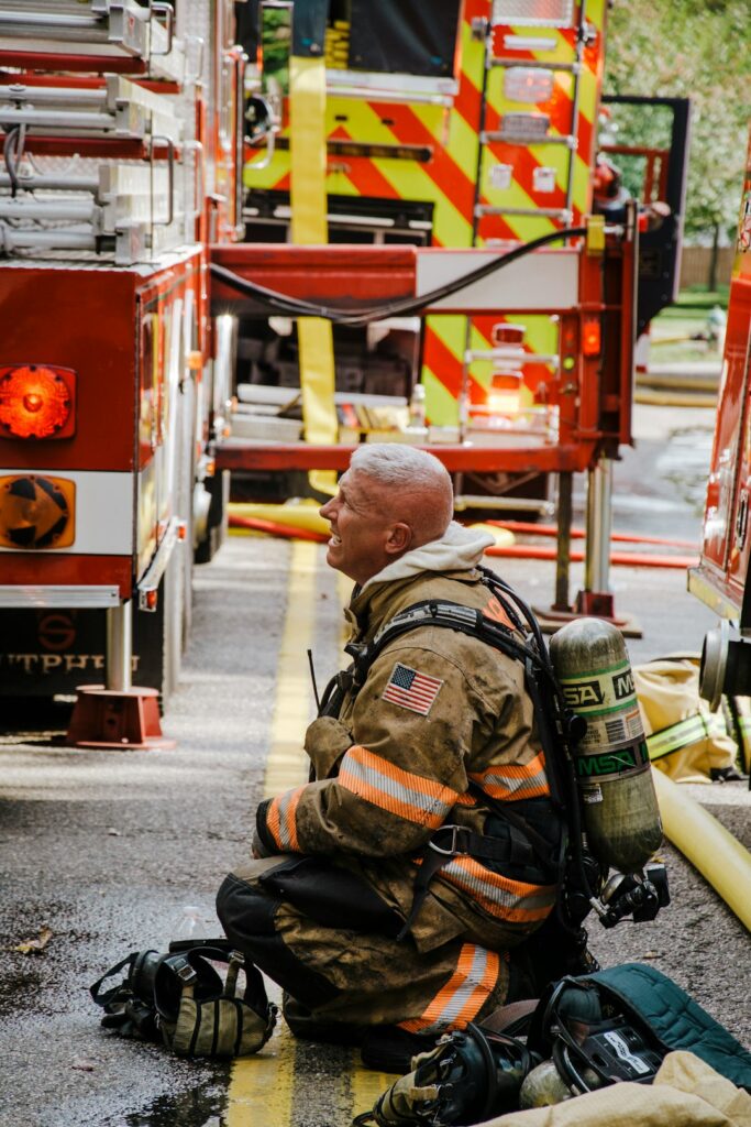 Firefighter kneeling